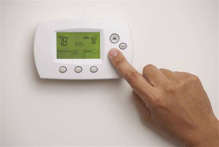 How do I lock my thermostat