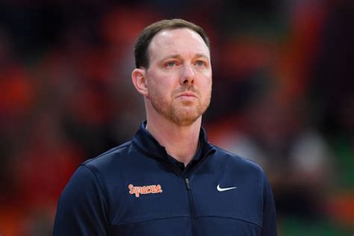 What happened Syracuse coach